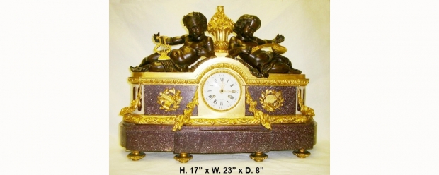 Exceptional French Louis xvi ormolu & patinated bronze mounted Porphry clock with Two reclining boys (1)