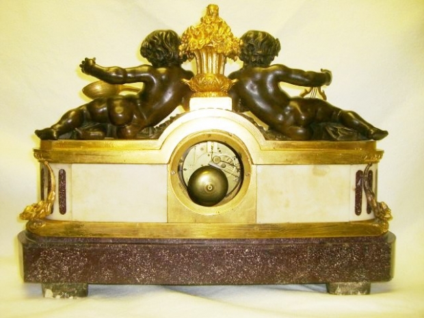 Exceptional French Louis xvi ormolu & patinated bronze mounted Porphry clock with Two reclining boys (7)
