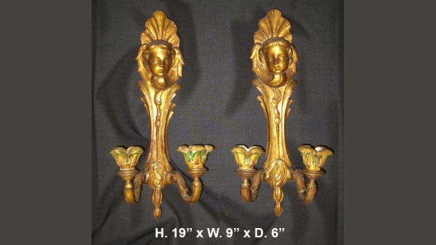 Pair Italian carved giltwood 2 light sconces with heads