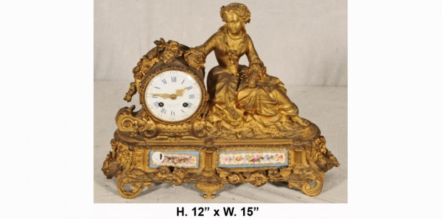 19c French porcelain mounted ormolu clock with reclining woman